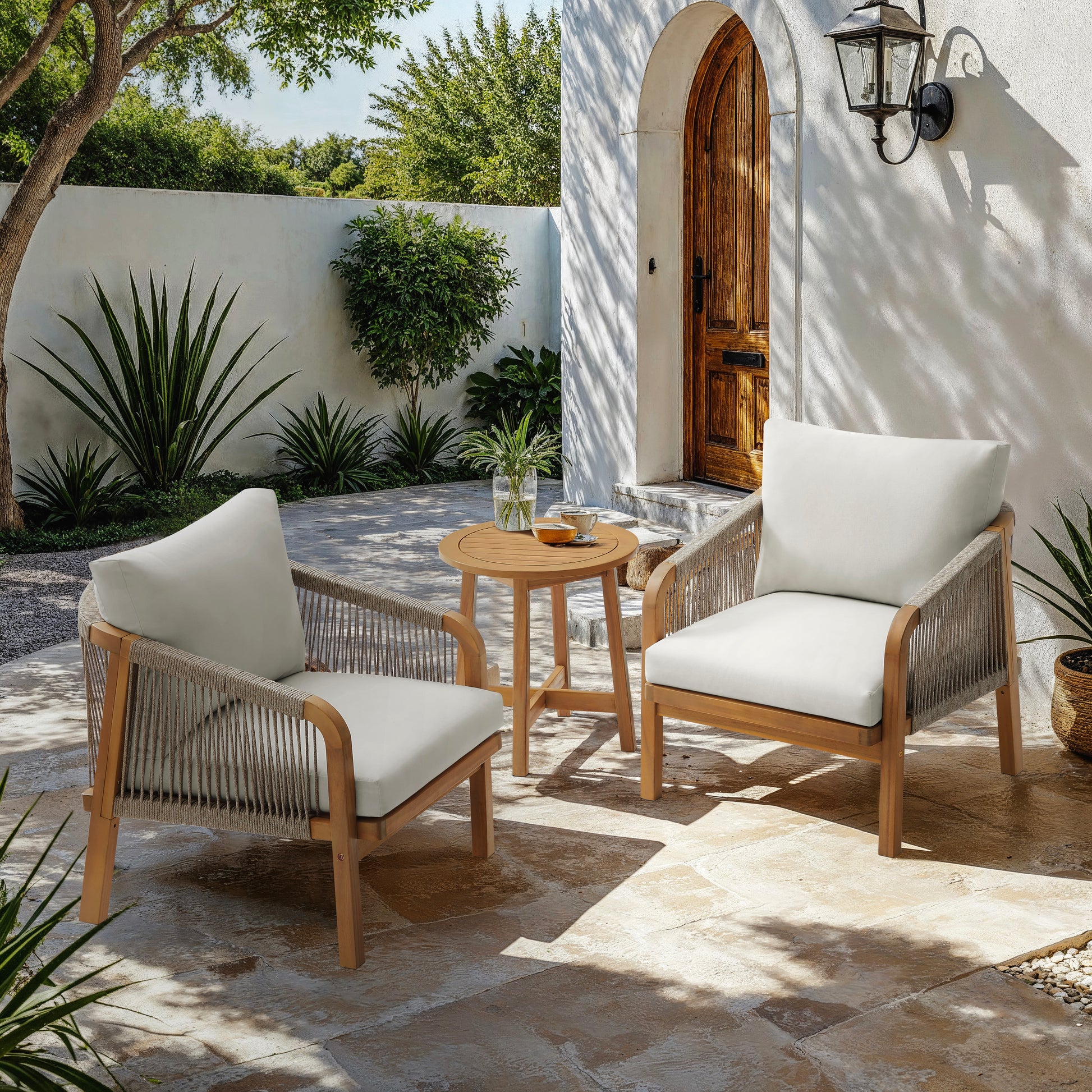 Adele outdoor chat set displayed on patio with side table