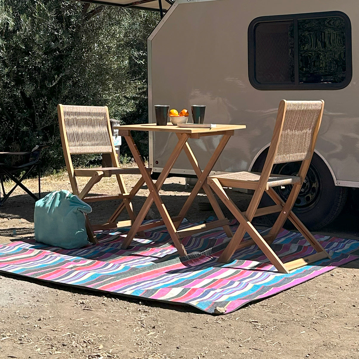 morning coffee camping near trailer with Kyndway Brixi bistro table and chairs