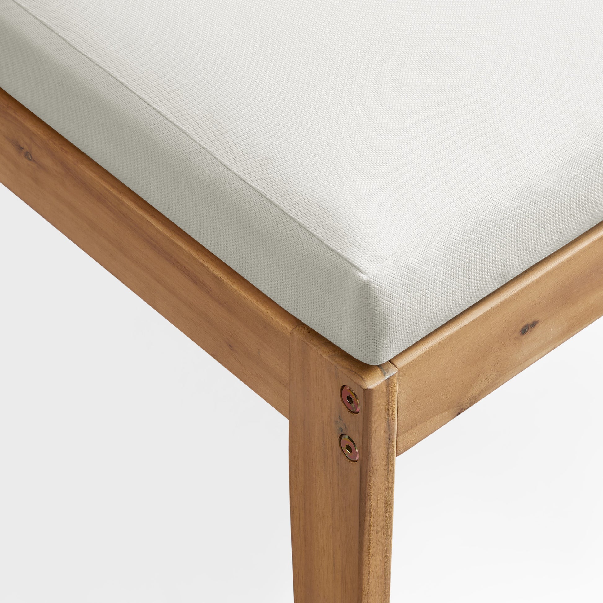 Dara sectional acacia wood outdoor modular chair leg close-up